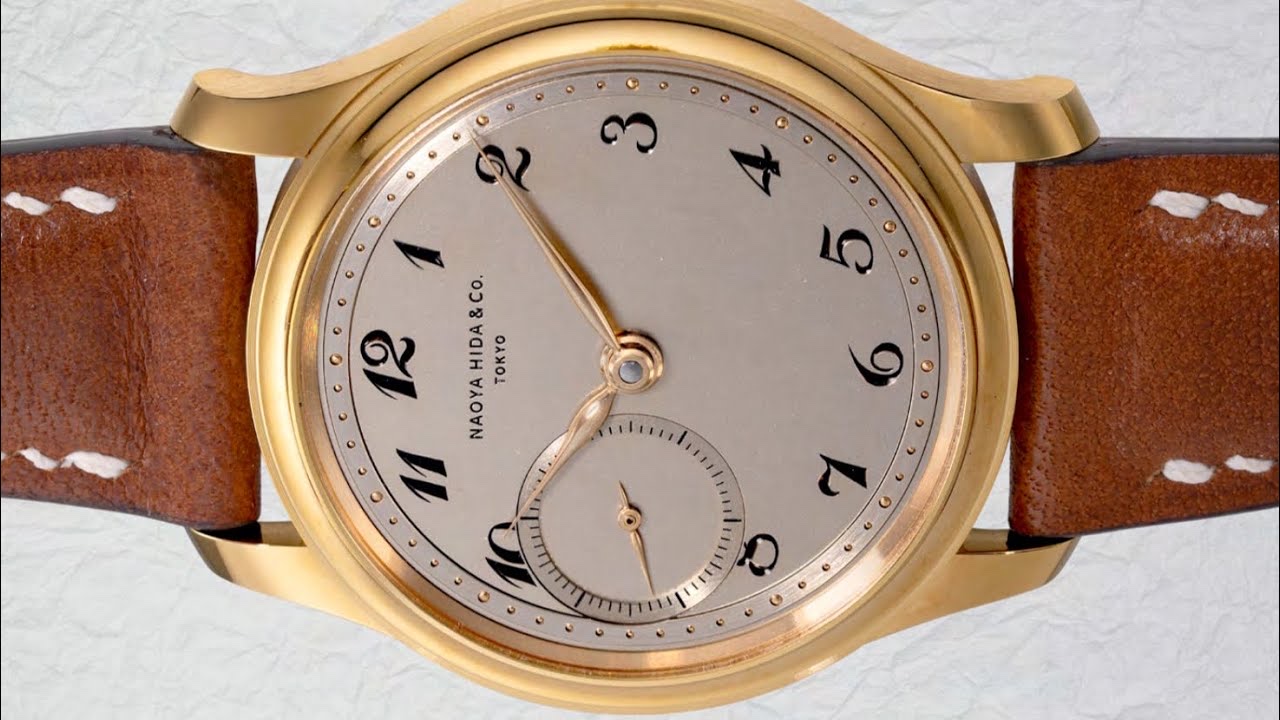 Naoya Hida Type 1D‑2: vàng 18K và số khắc tay