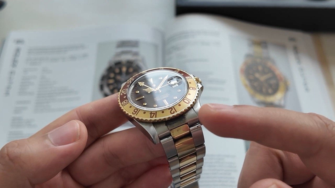Cạnh vỏ và vành nhôm Rolex GMT-Master 1675