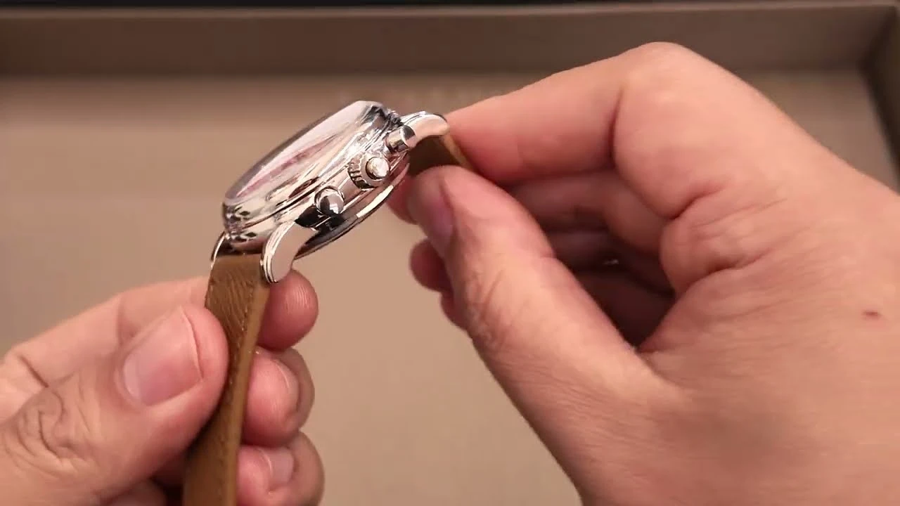 Cạnh vỏ và nút bấm Patek Philippe Ref. 5004