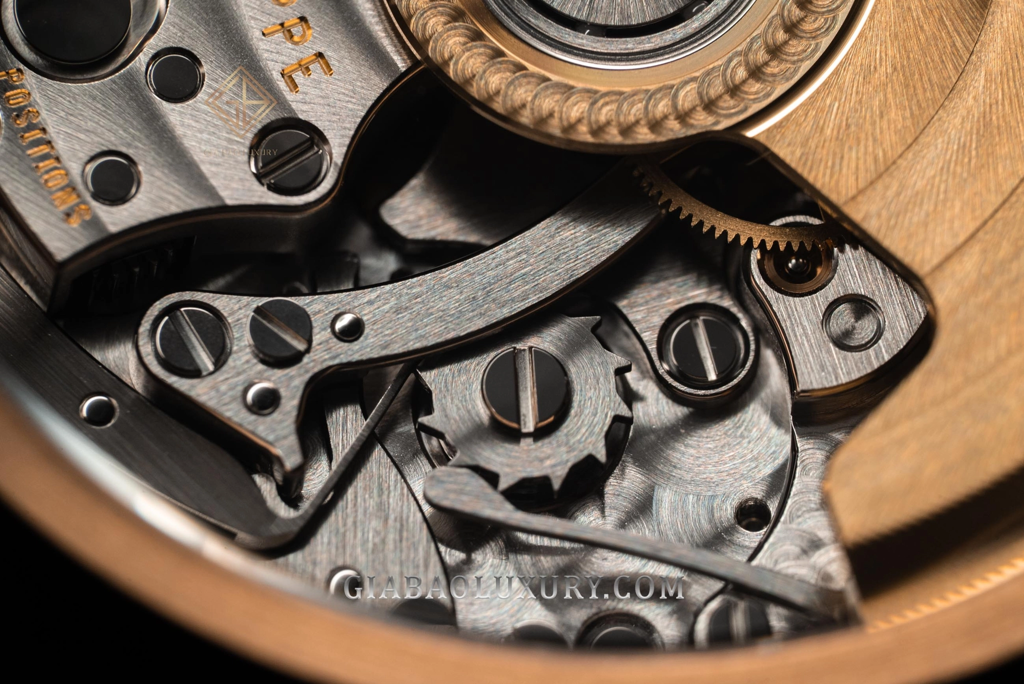 Patek Philippe 5905R và Rolex Daytona 116515LN: chi tiết chronograph bánh xe cột và ly hợp dọc của calibre Patek Philippe