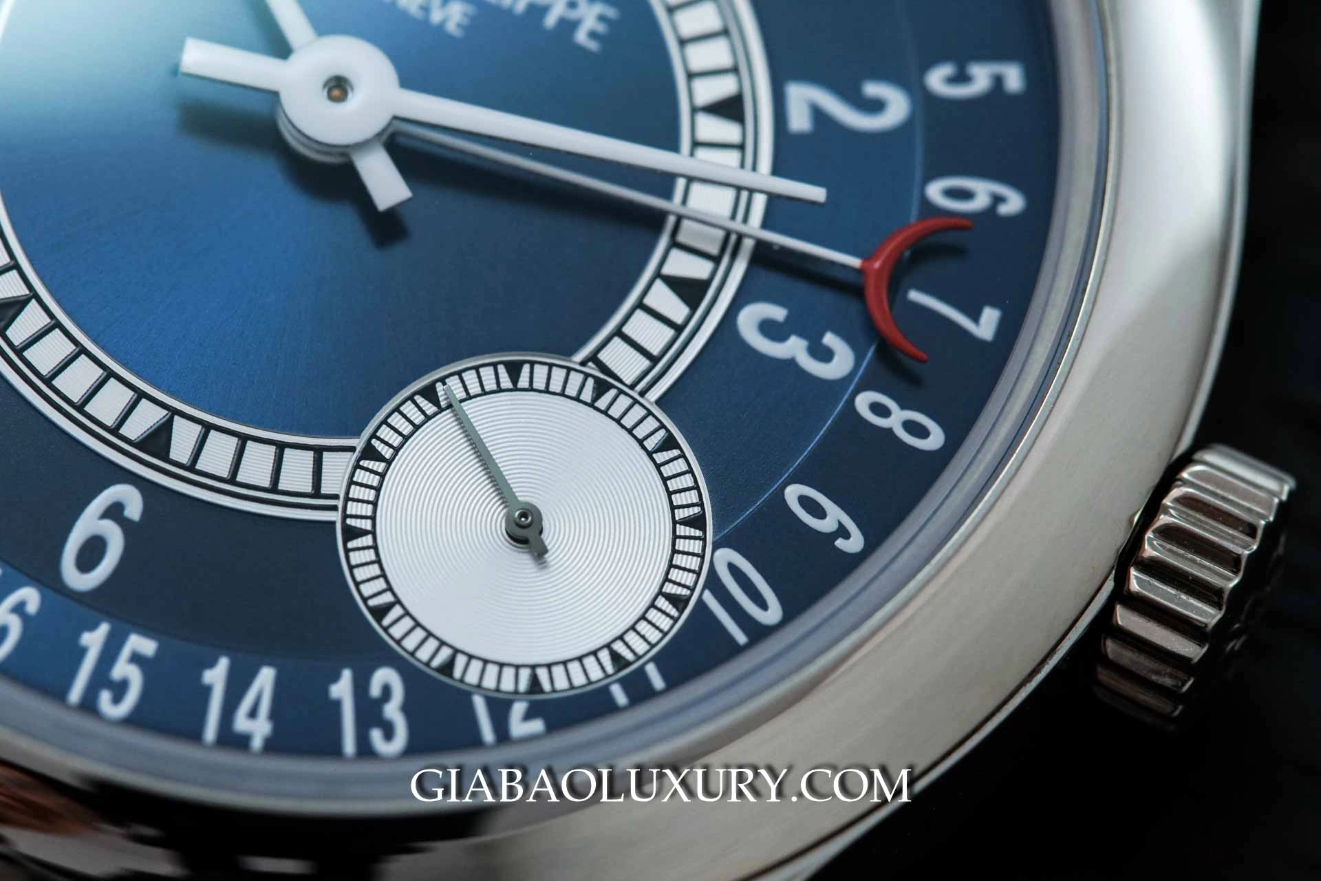 Patek Philippe Calatrava 6000G: lịch ngày dạng kim: kim ngày đầu đỏ và mặt số giây nhỏ