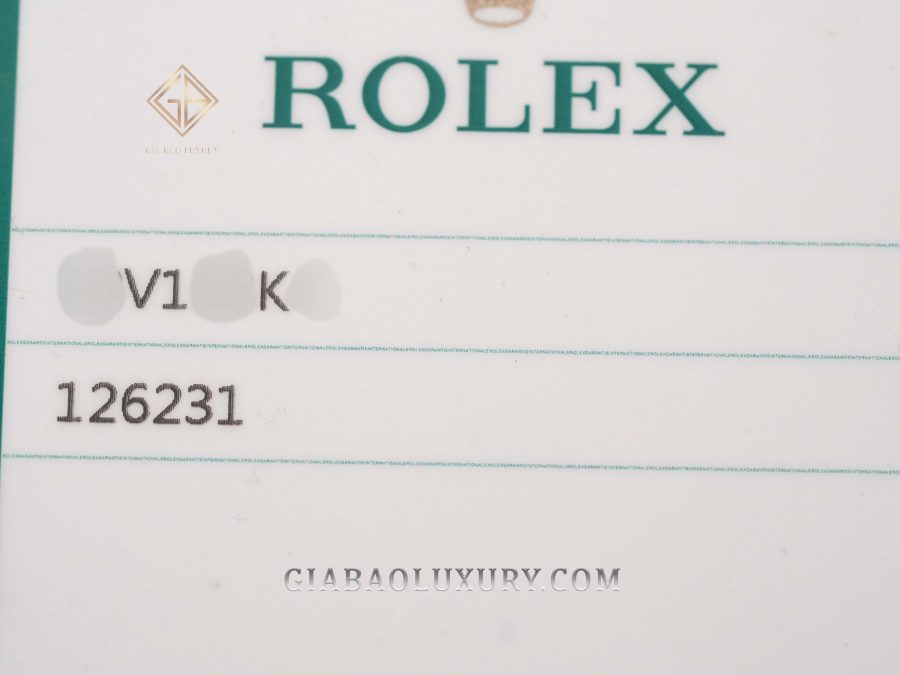 Thẻ bảo hành Rolex xanh trắng với serial được che một phần
