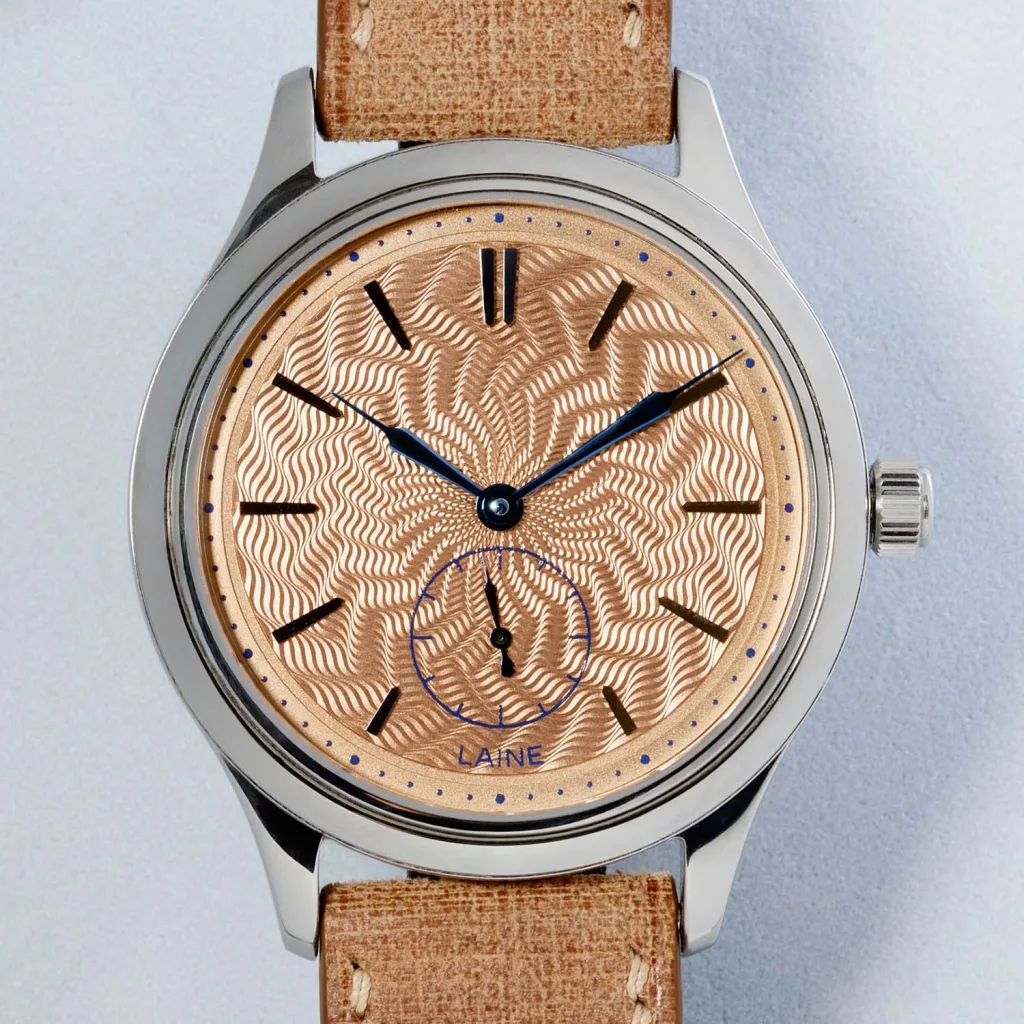 Laine P37 mặt số salmon họa tiết Spider
